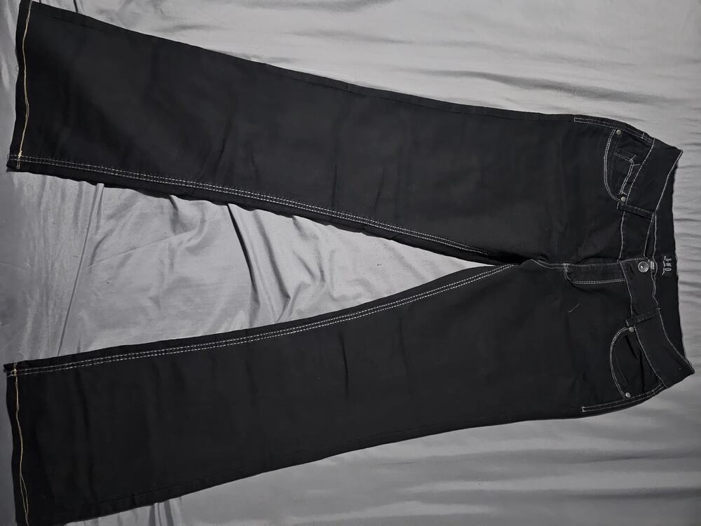 Black denim jeans with white contrast stitching five pocket design